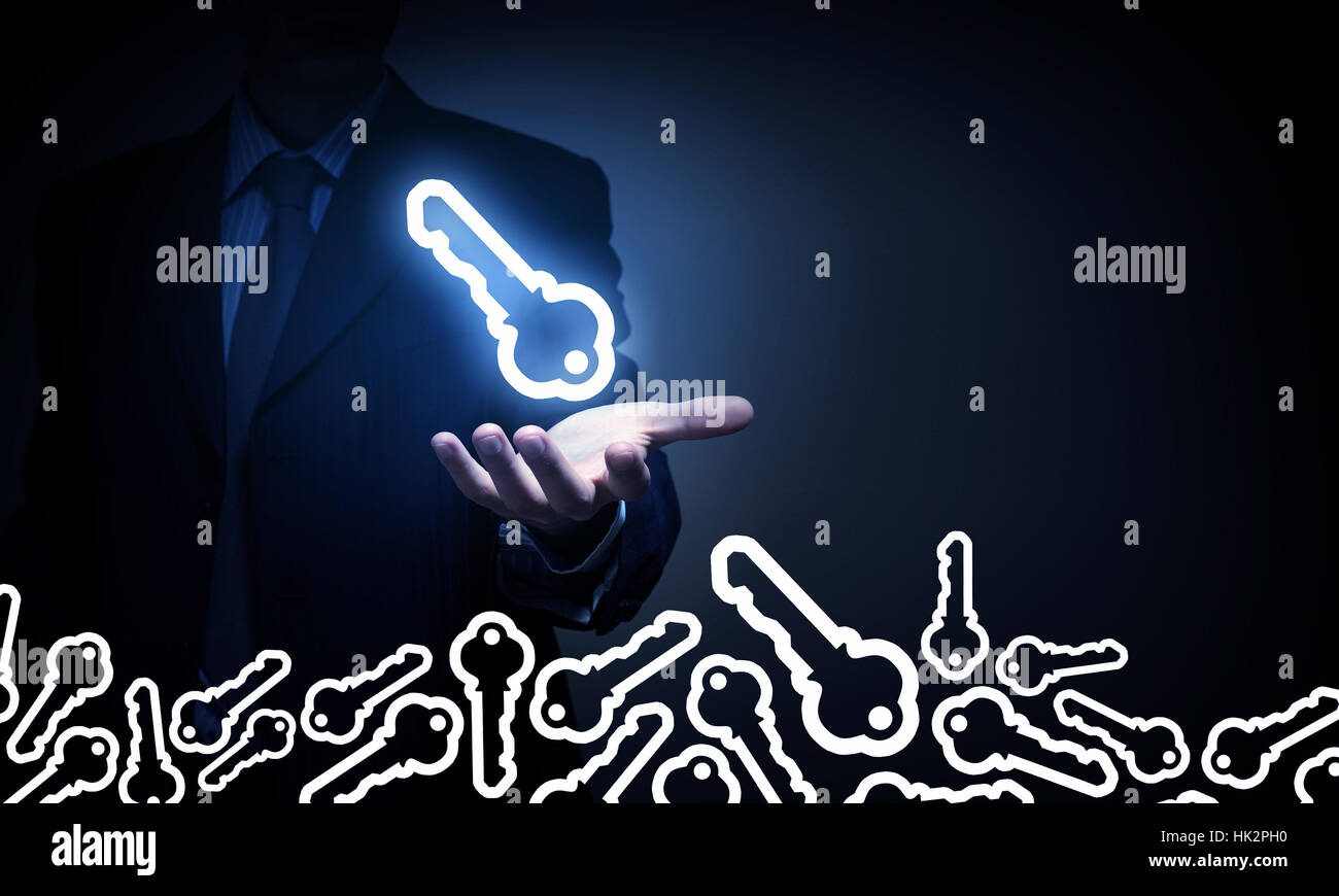 Male hand holding key glowing sign in palms hi-res stock photography ...