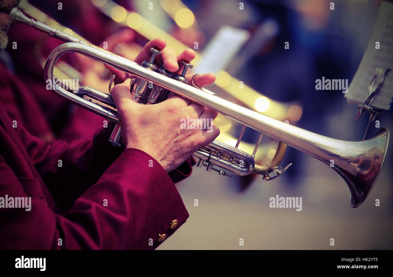 trumpeter plays his trumpet in the brass band during live event Stock ...