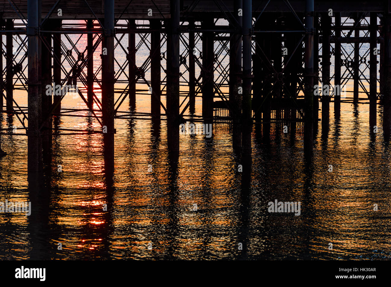 Sunrise under the pier Stock Photo