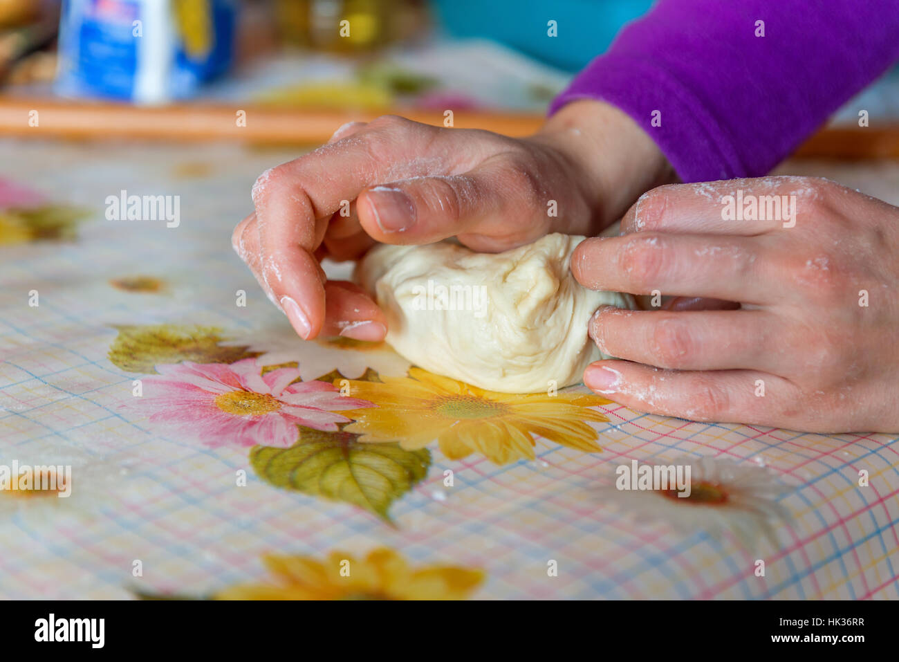 Woman hands kneading dough on the table at home Stock Photo - Alamy