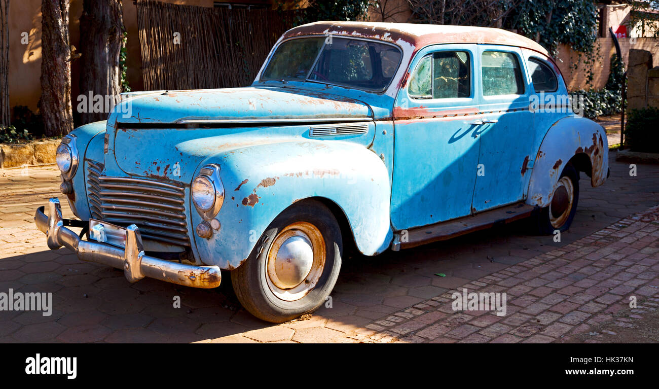 in south africa old abandoned american vintage car and  the house courtyard Stock Photo