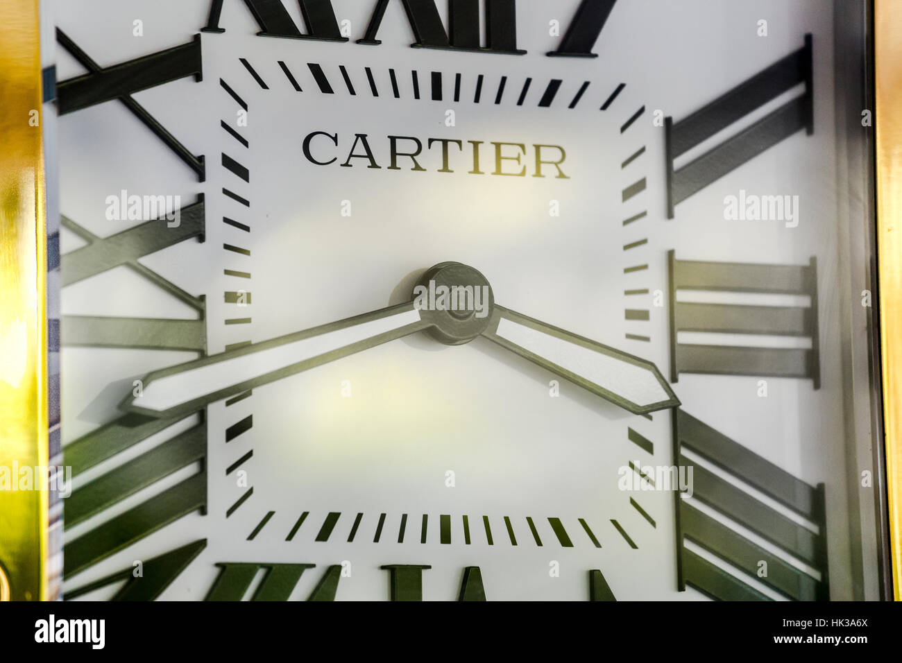Close up of square luxury wall clock Cartier Stock Photo