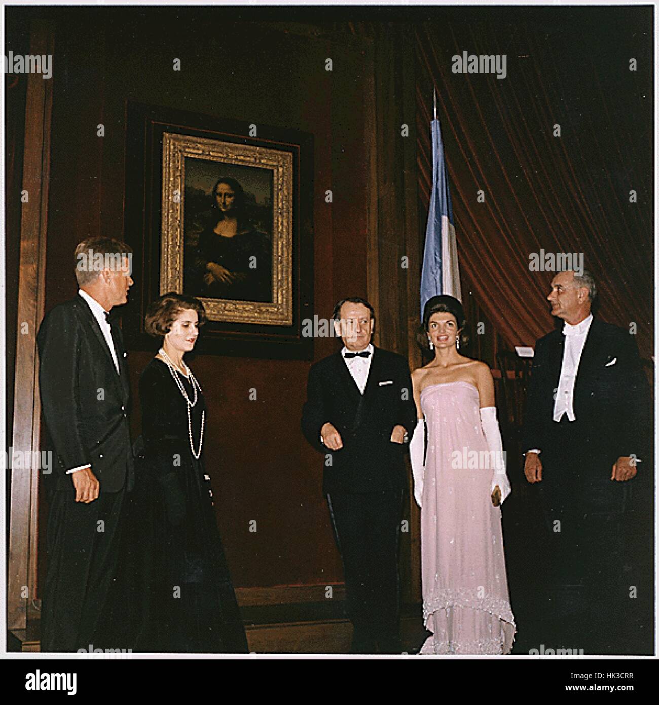 Unveiling of the Mona Lisa at the National Gallery of Art on January 8, 1963. Left to right: United States President John F. Kennedy, Madame Malraux, French MInister of Cultural Affairs Andre Malraux, first lady Jacqueline Kennedy, United States Vice Pres Stock Photo