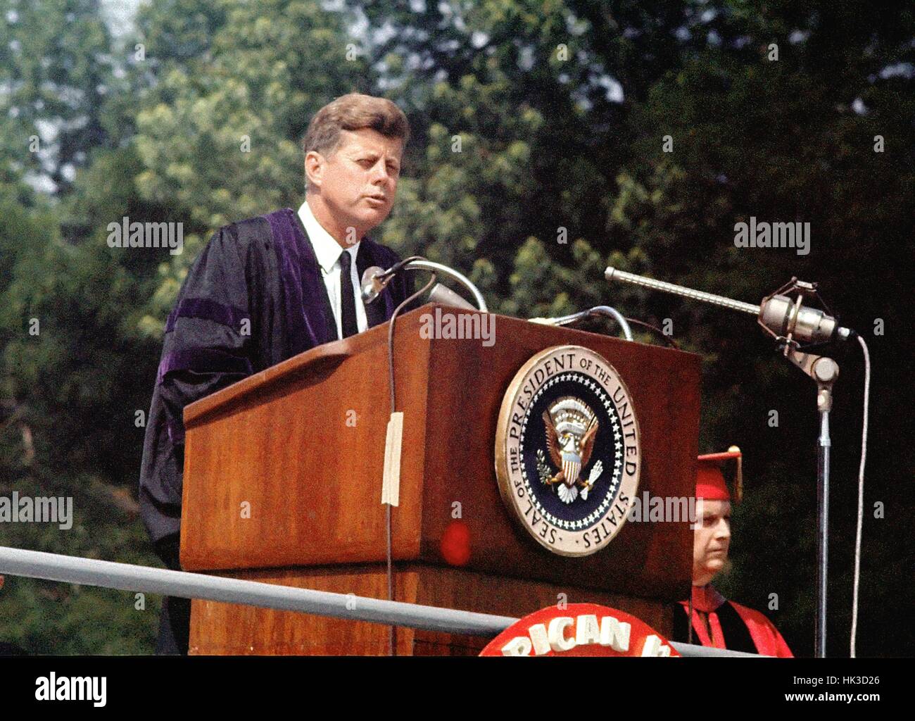 United States President John F. Kennedy speaks at the American University commencement in Washington, D.C. on June 10, 1963. This speech is known as Kennedy's 'Pax Americana' speech, where he outlined his vision for world peace. Stock Photo
