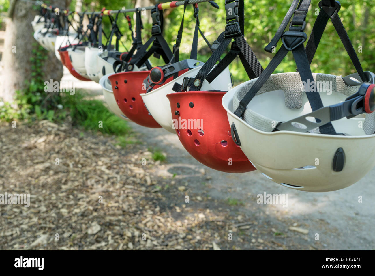 Row with red and white safety helmets Stock Photo