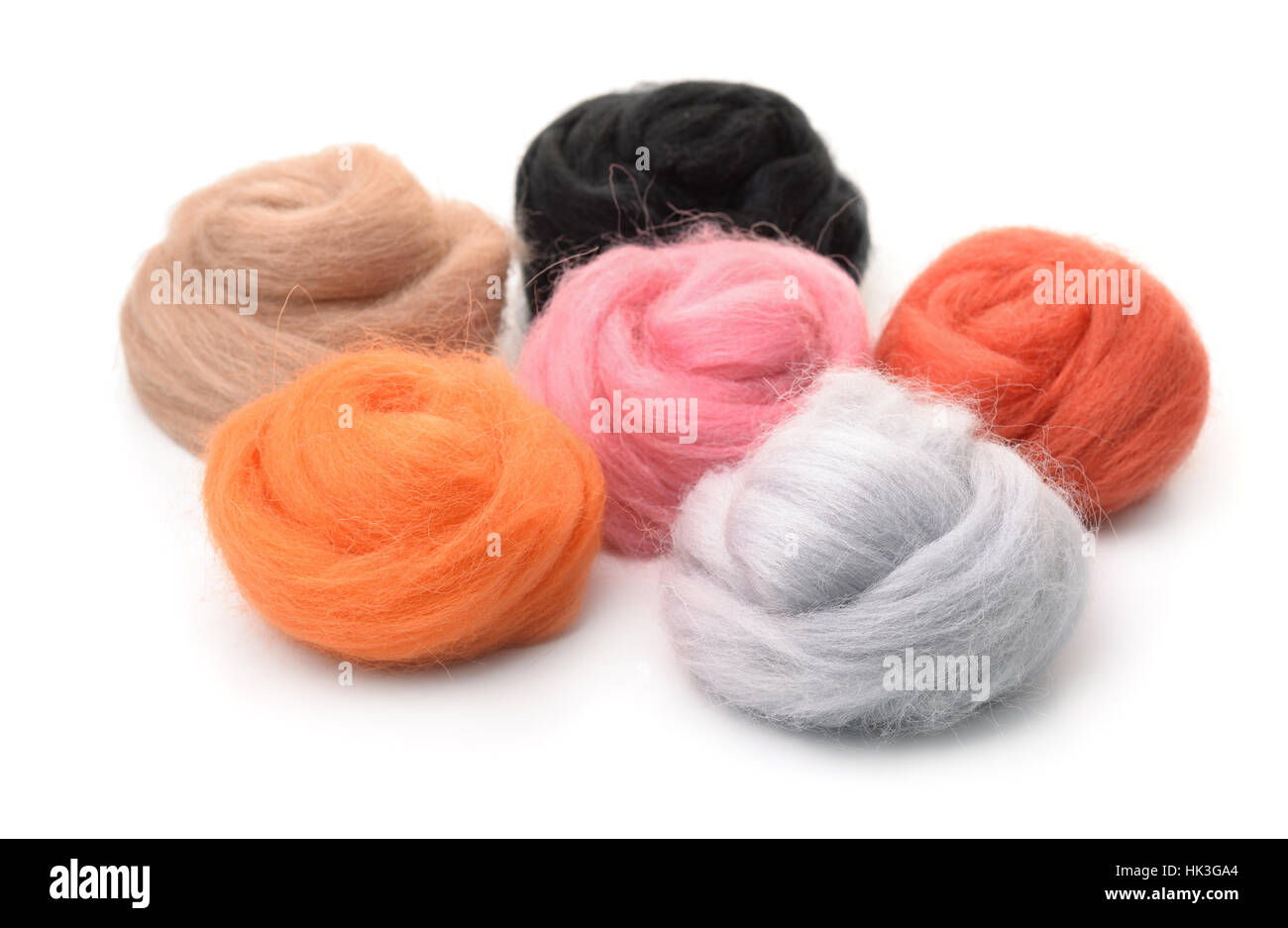 Group of color needle felting wool isolated on white Stock Photo
