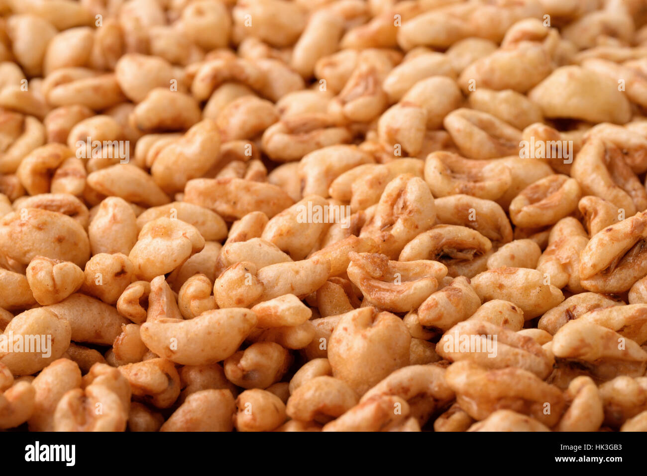 Puffed wheat cereal background Stock Photo