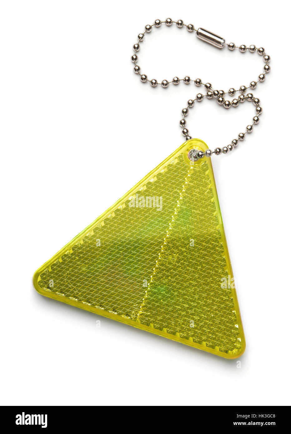 Yellow pedestrian safety reflector keyring isolated on white Stock Photo