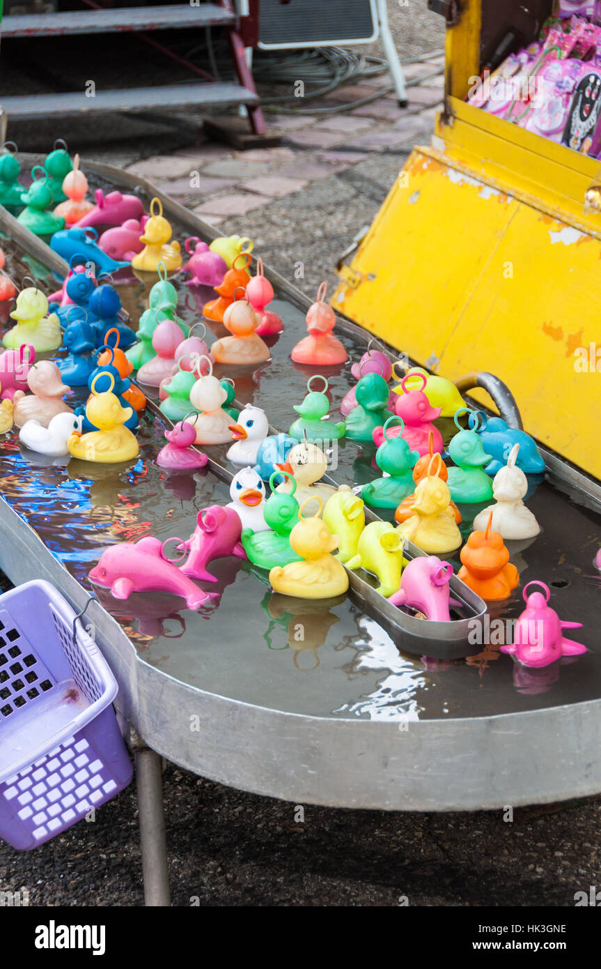 Group of rubber ducks fishing game for children, at fair Stock