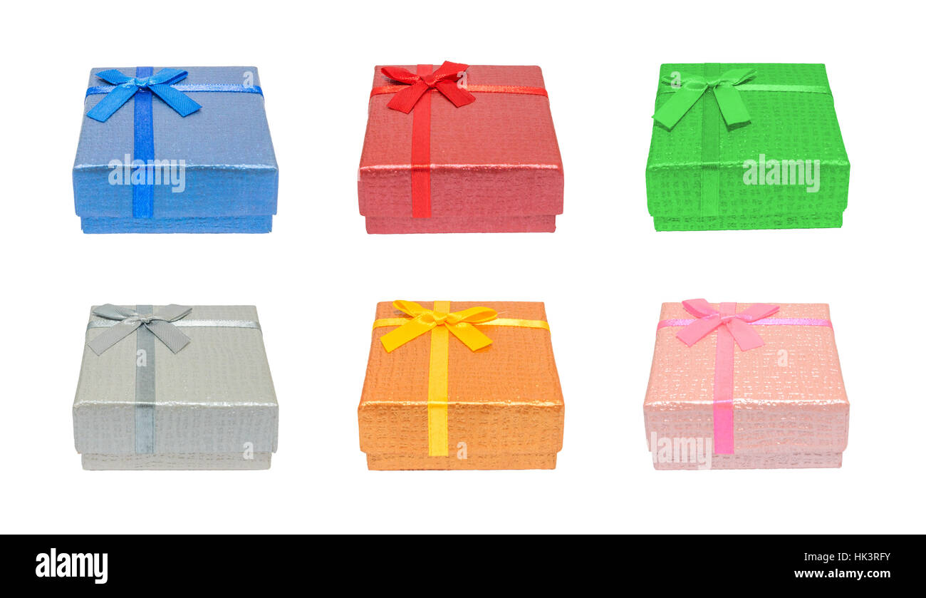 Front view of various shiny colorful blue, red, green, silver, gold, pink rectangle christmas gift or present boxes, isolation on white background wit Stock Photo