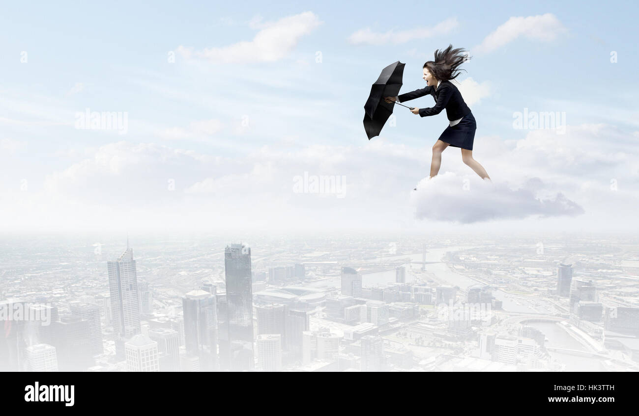 Strong wind umbrella hi-res stock photography and images - Alamy