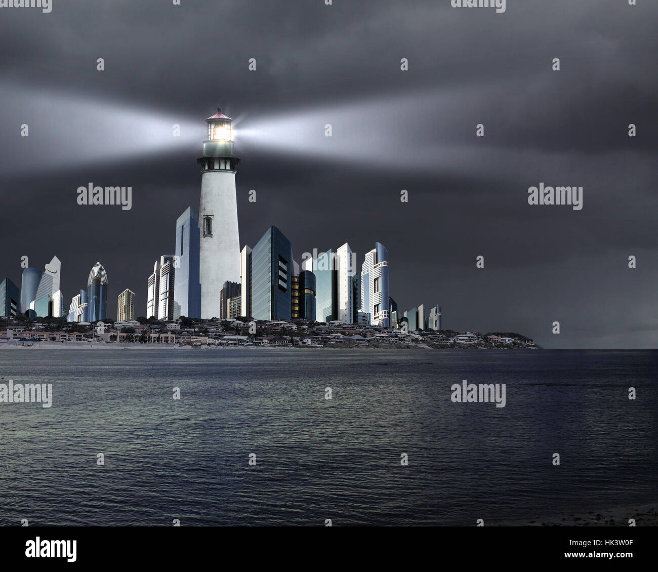 Collage with lighthouse at night with beam of light Stock Photo - Alamy