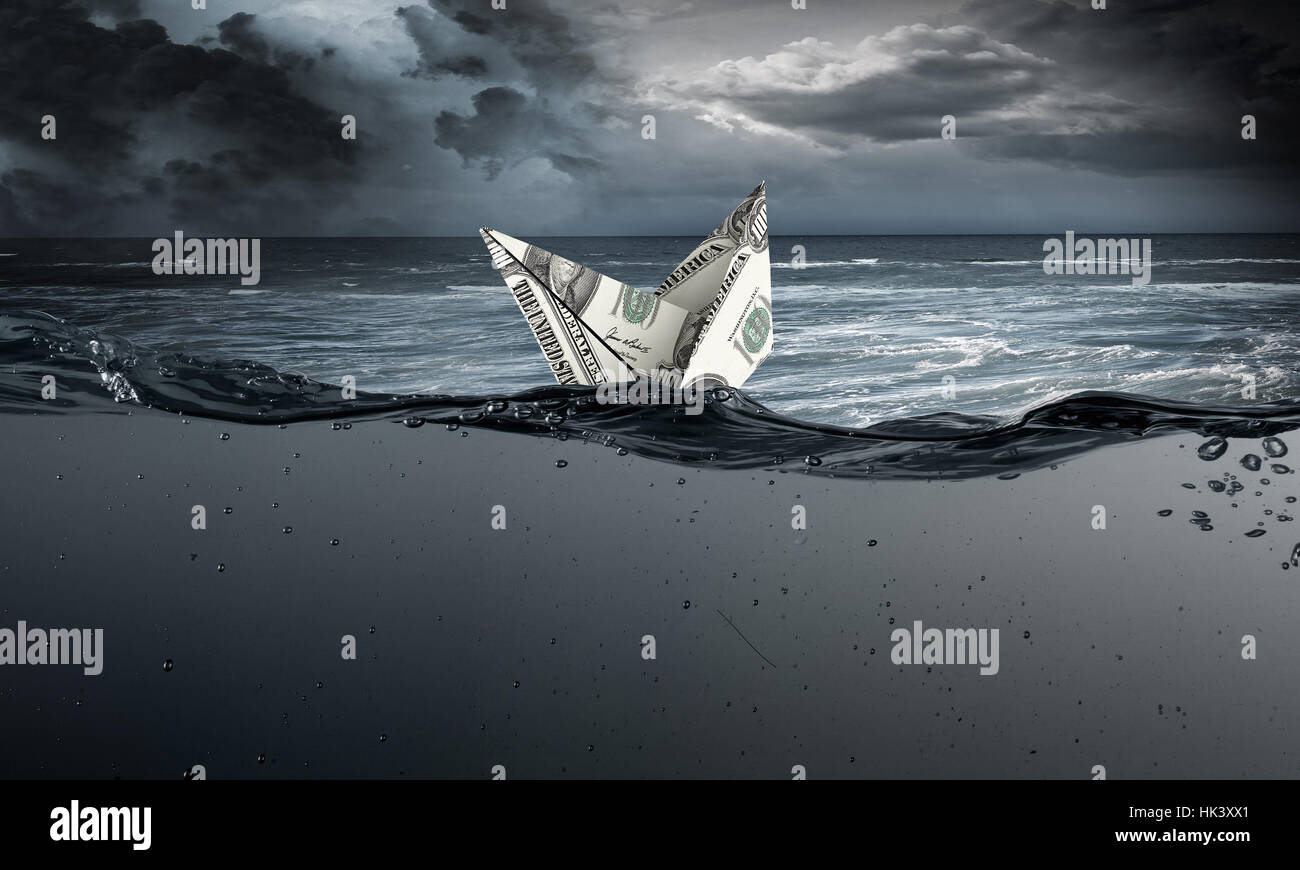 Ship made of dollar banknote sinking in water Stock Photo - Alamy