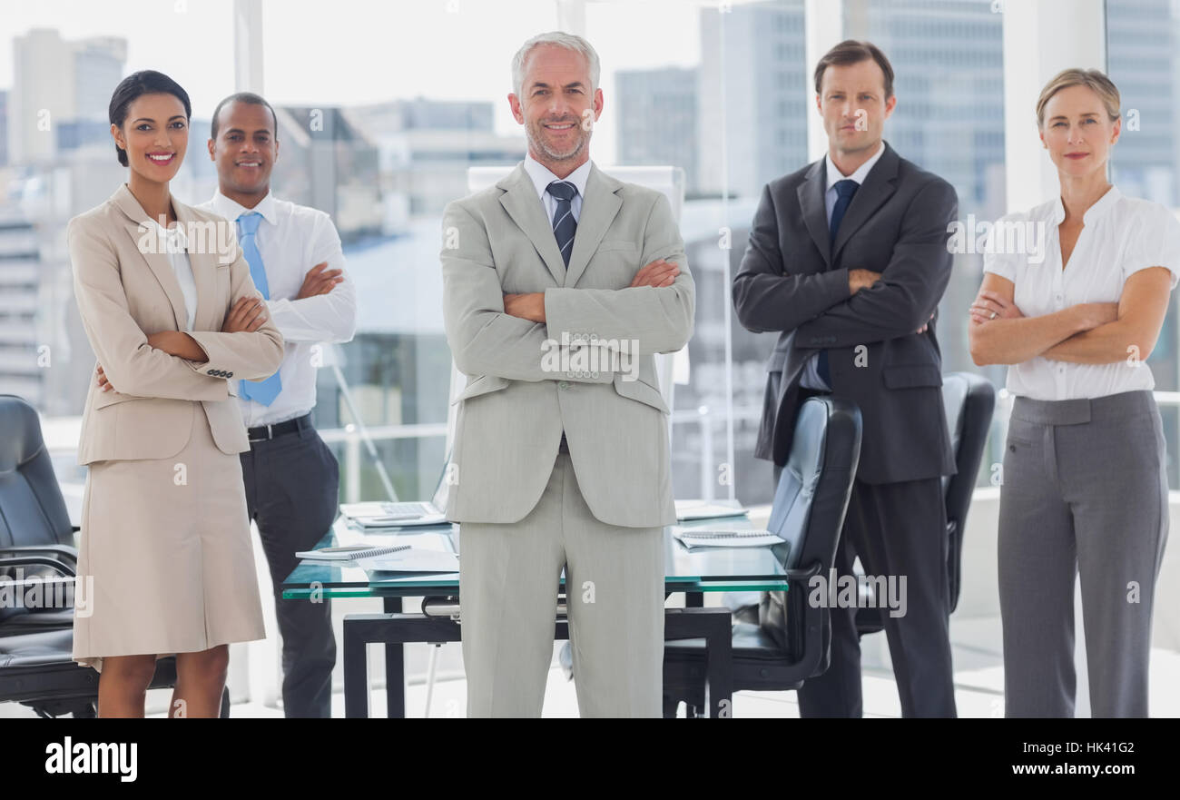 Cheerful team of business people posing together in the boardroom Stock ...