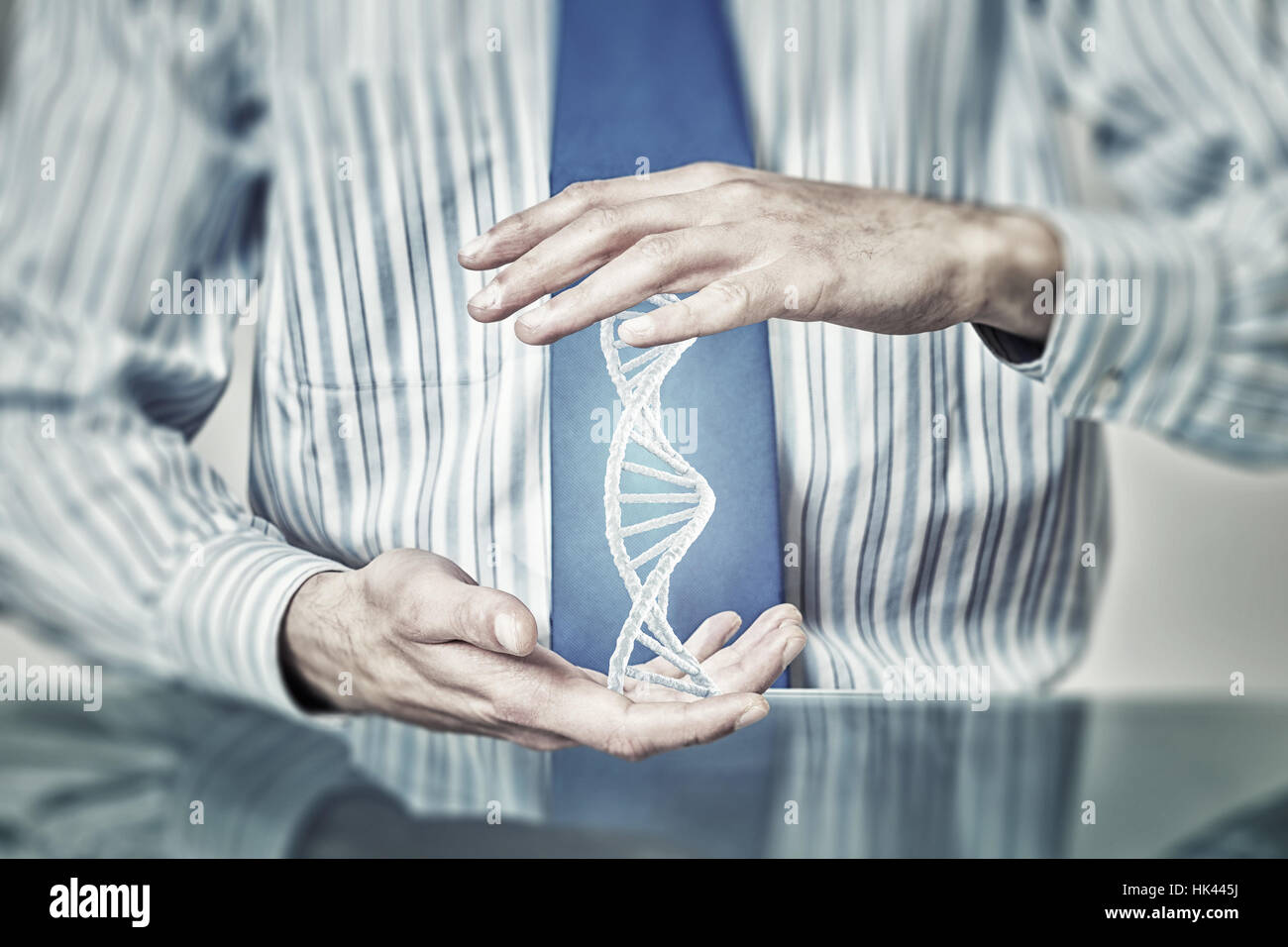 Hands of businessman holding with care molecule concept Stock Photo - Alamy