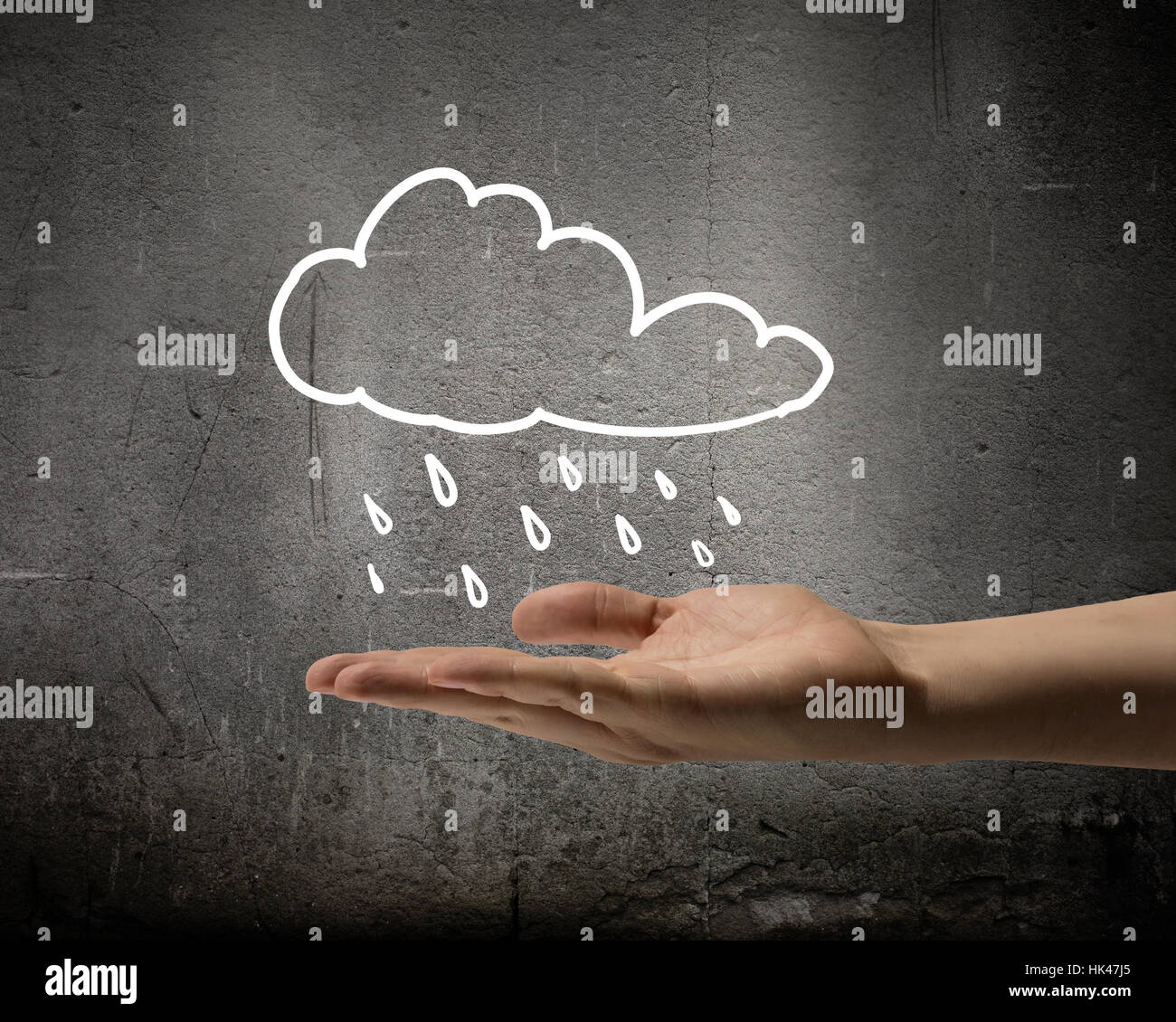 Background conceptual image with raining cloud in hand Stock Photo - Alamy