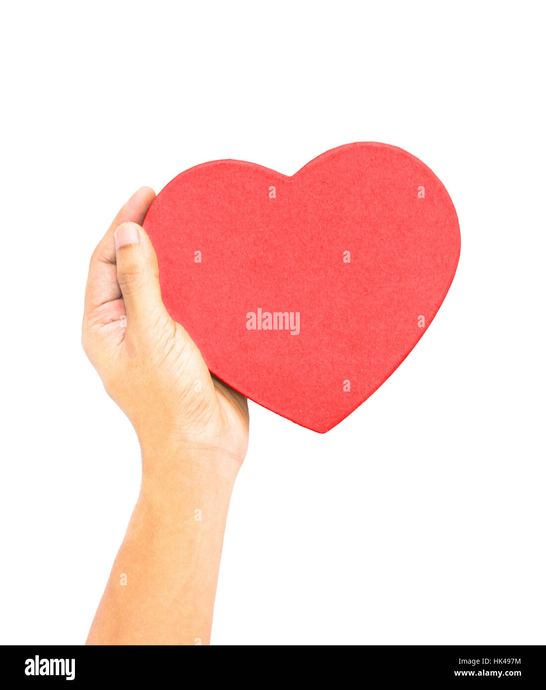 One hand holding red heart shaped box lid, love, care, healthcare, medical care, heart disease protection metaphor concept isolation on white with cli Stock Photo