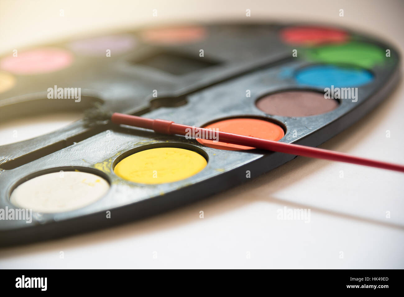 Palette of water color tray on white background, Art metaphor concept, close up, selective focus Stock Photo