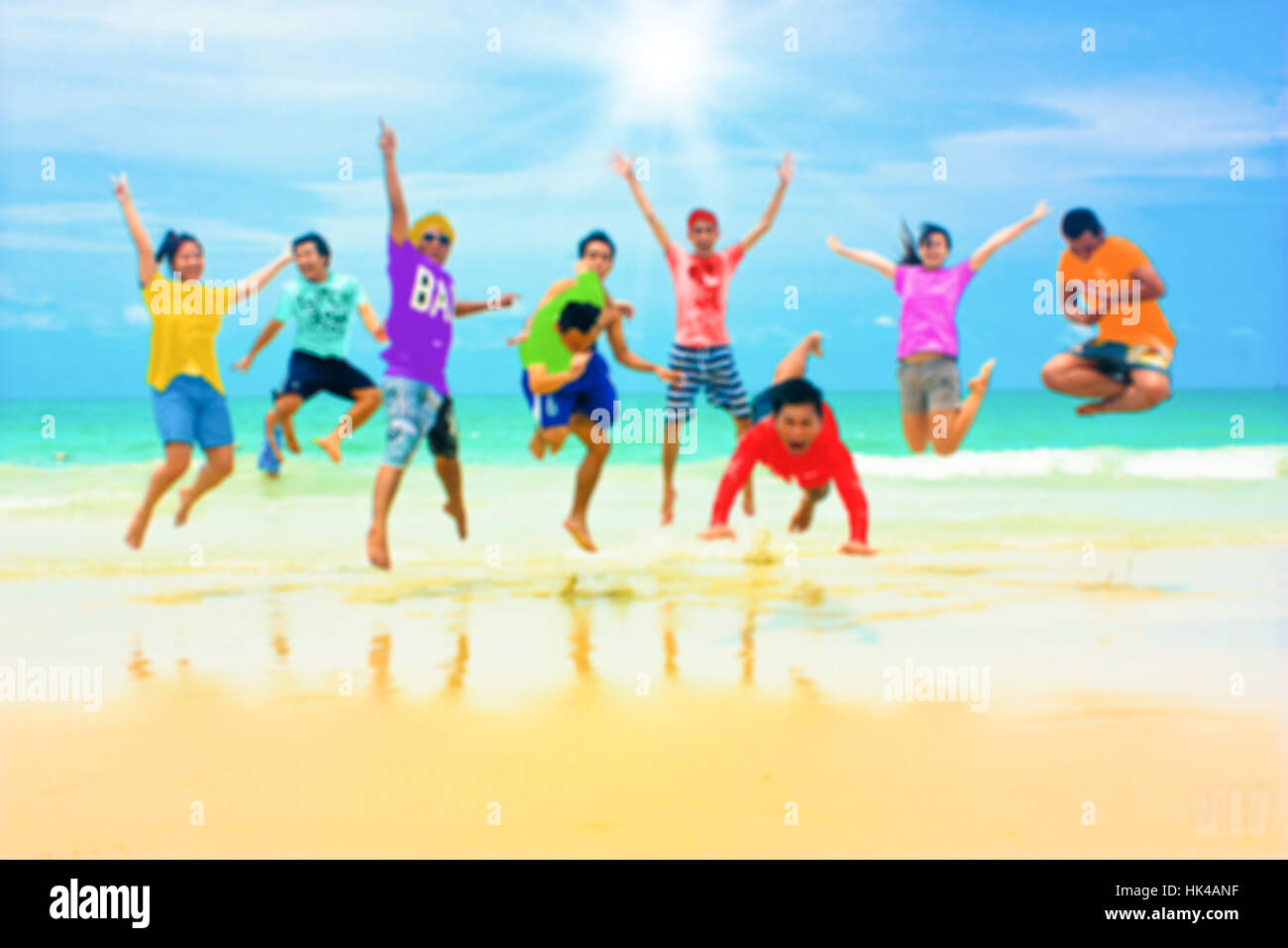 Beach Party Jumping Blur Defocus Stock Photo