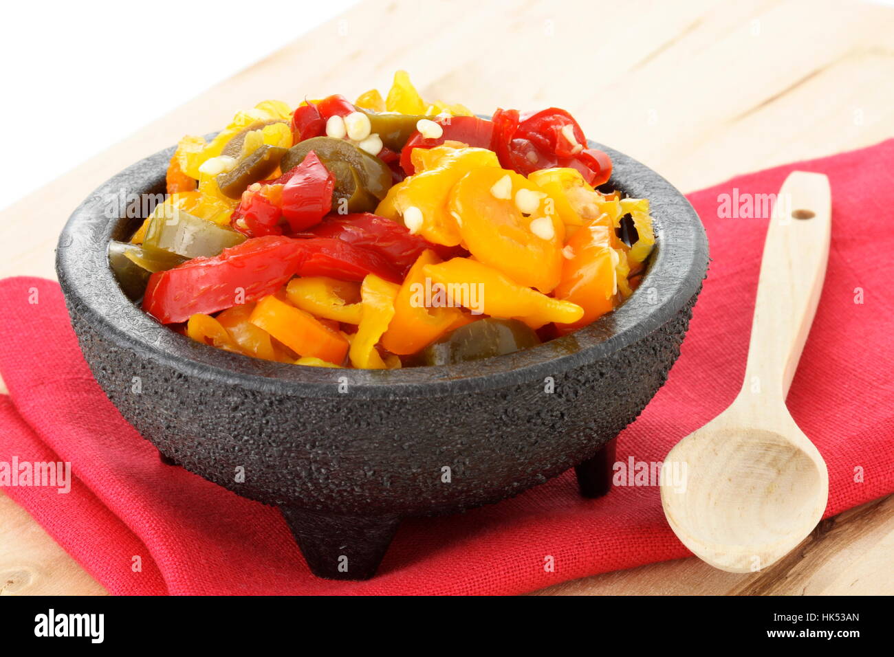 delicious sliced pickled hot jalapenos, habaneros and chile de arbol