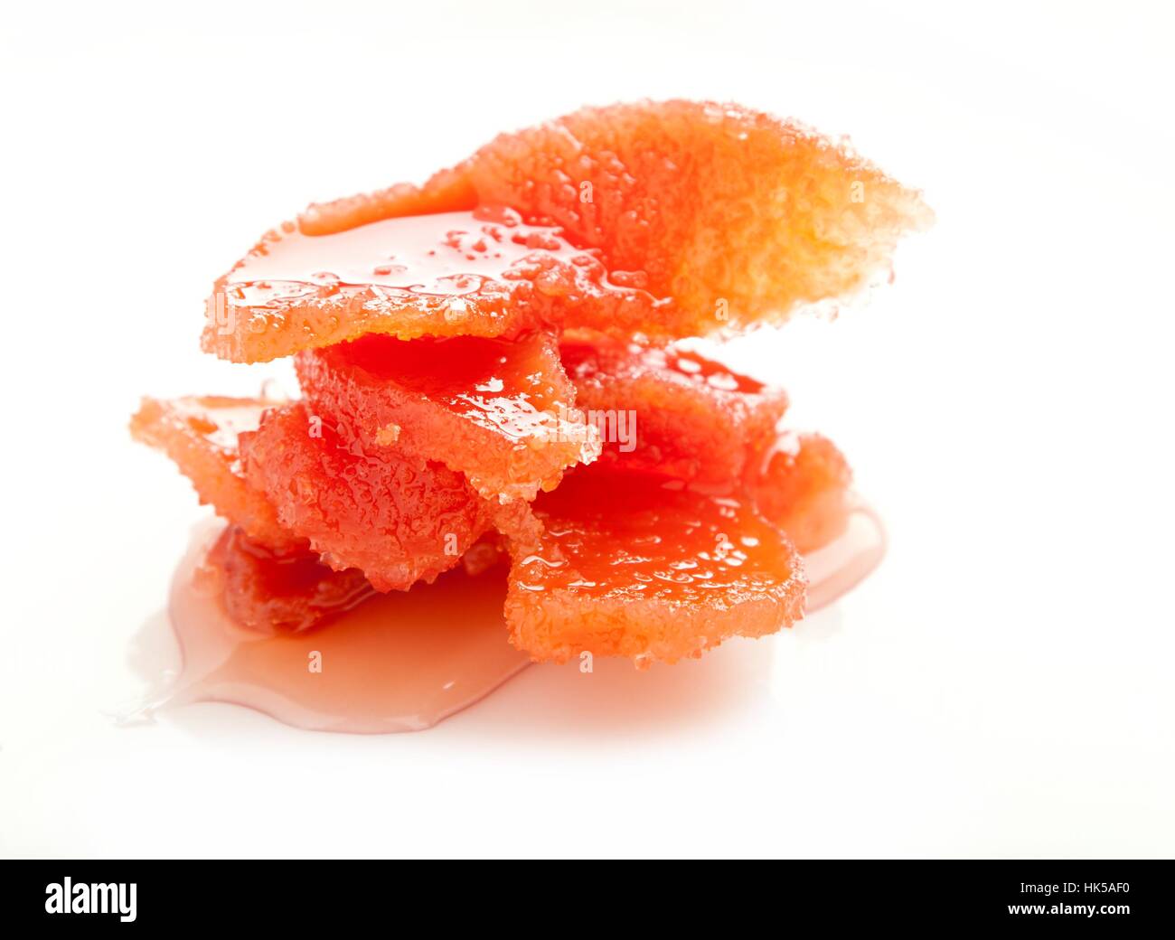 candied segment of quince in sweet jam Stock Photo