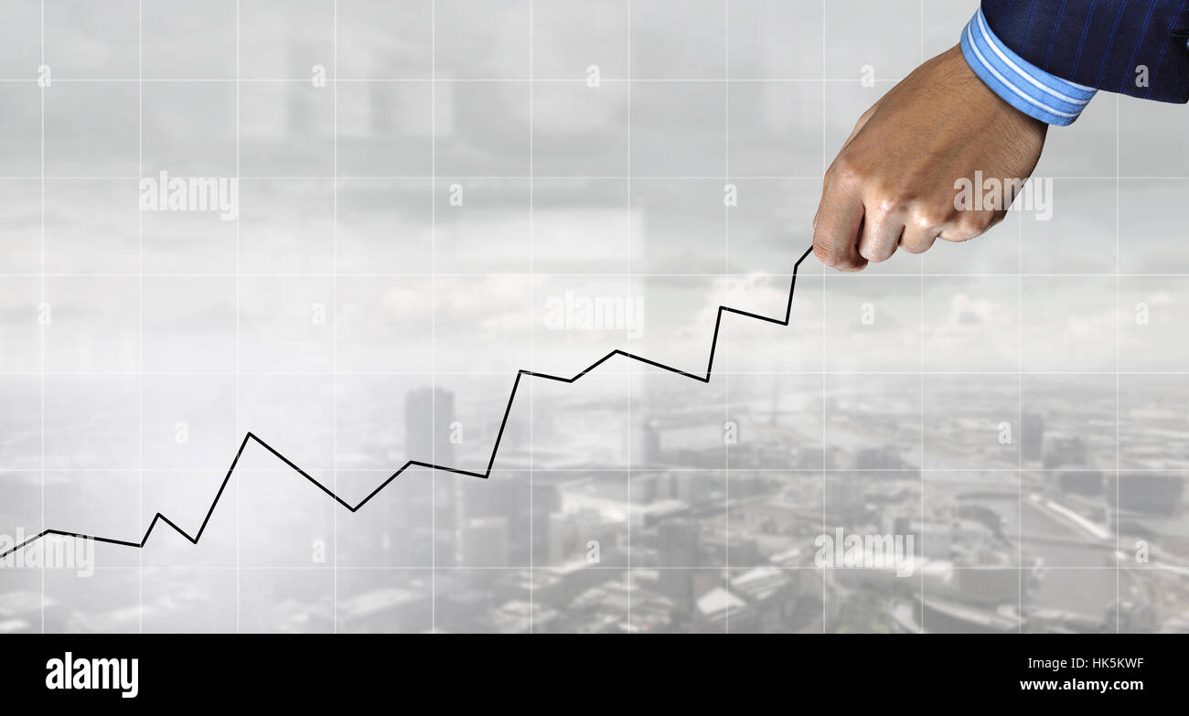 Hand of businessman drawing with pencil increasing graph Stock Photo ...
