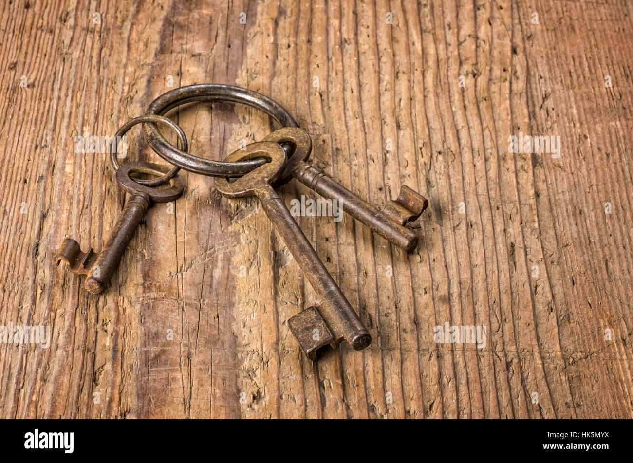 three old keys on a key ring Stock Photo