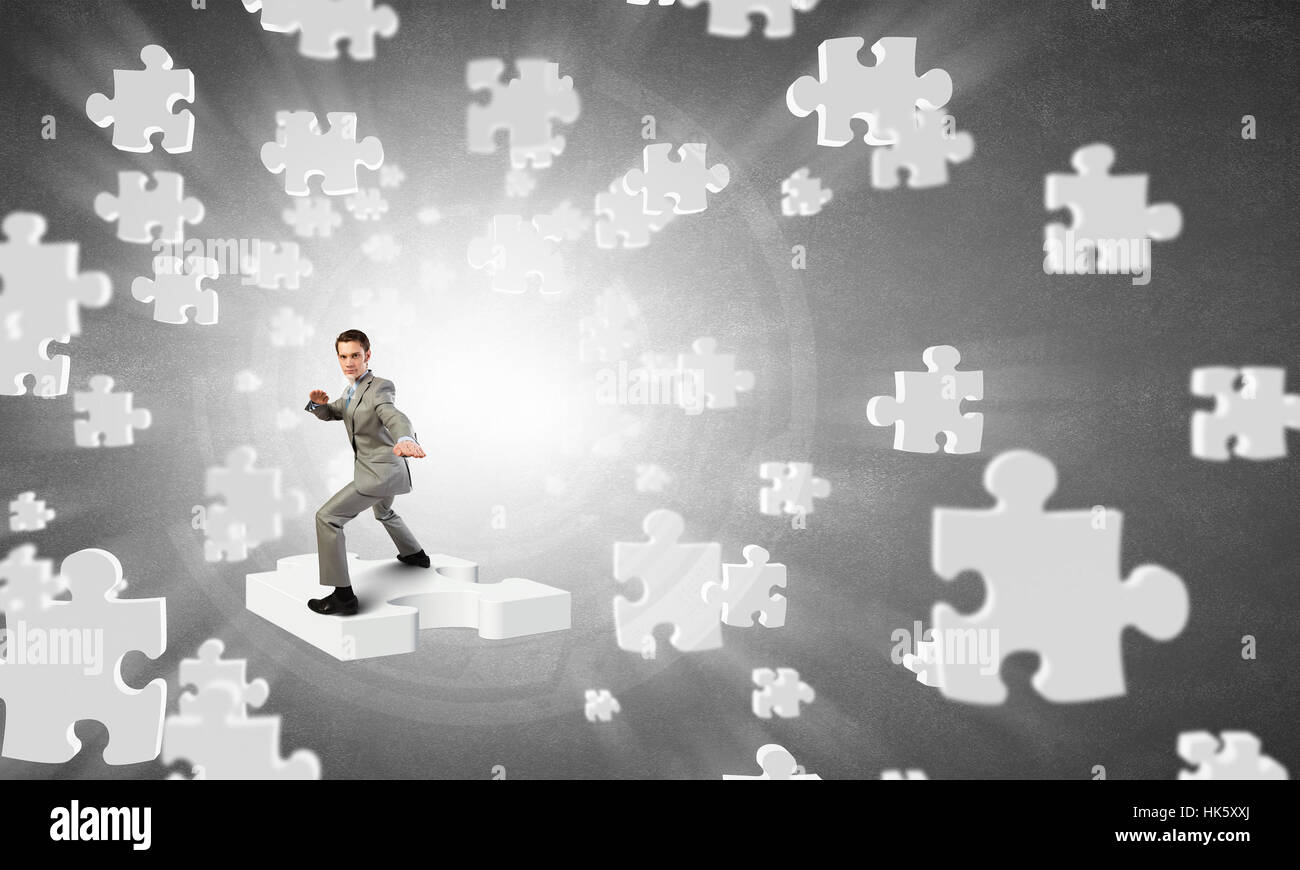 Cheerful businessman demonstrating hi-res stock photography and images ...