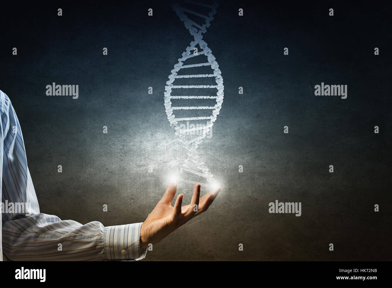 Hand of businessman holding dna molecule concept Stock Photo - Alamy