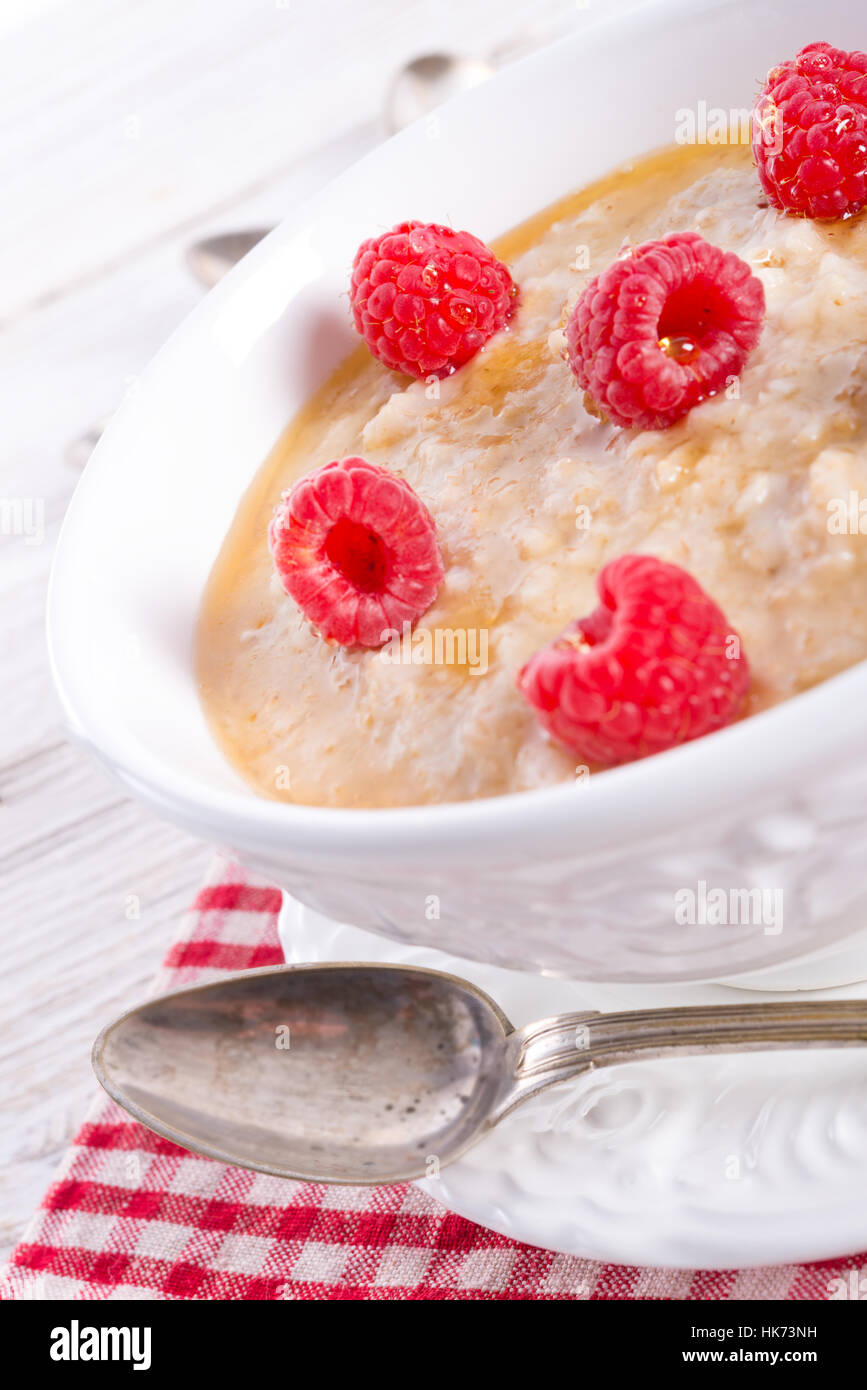 Oatmeal With Raspberry oatmeal with fresh raspberry Stock Photo - Alamy