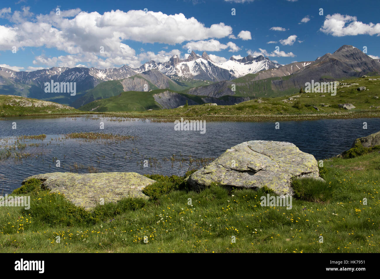 Alpine lake in the French Alps. Col-de-la-Croix-de-Fer, Auvergne-Rhone-Alpes, France Stock Photo