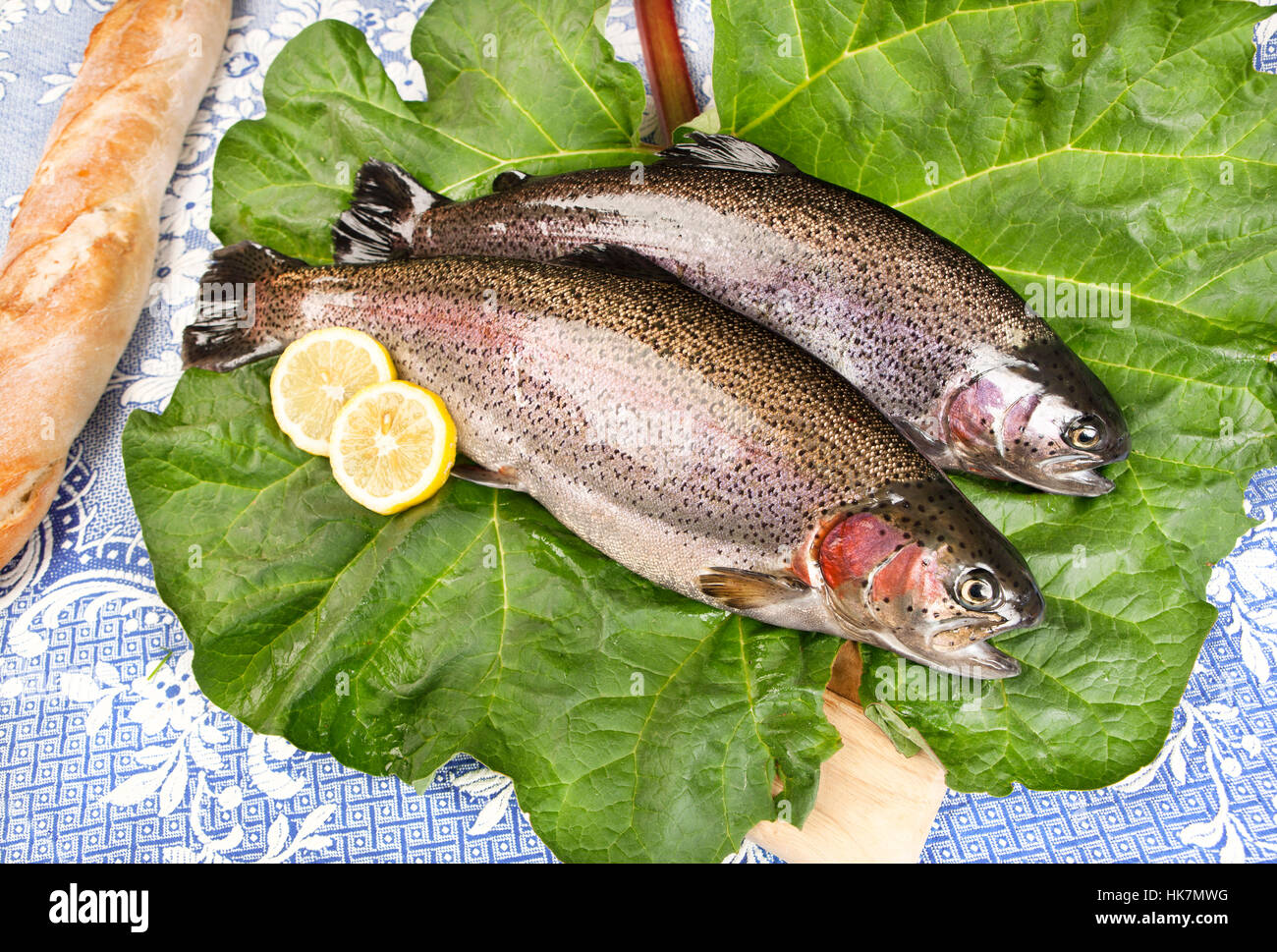 serve two freshly caught trout Stock Photo Alamy