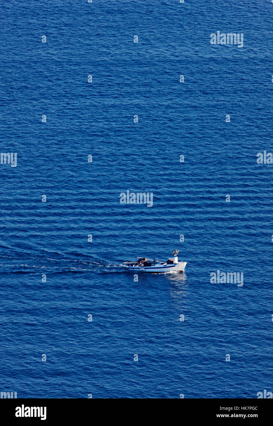 Small fishing boat sailing in Croatian sea, Kornati Stock Photo