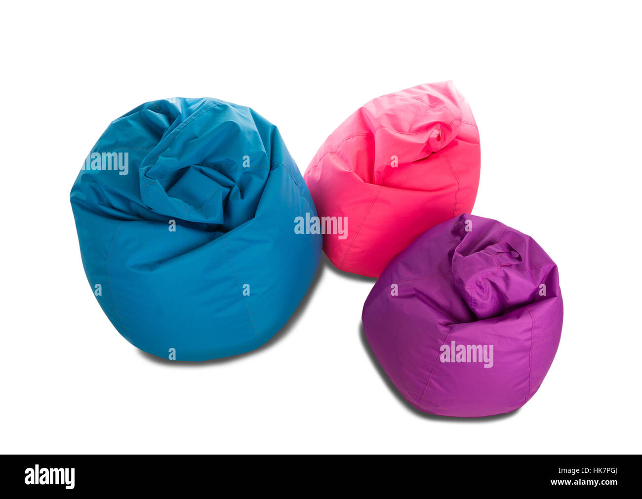 Blue, pink and purple beanbag chairs for living room isolated on white background Stock Photo
