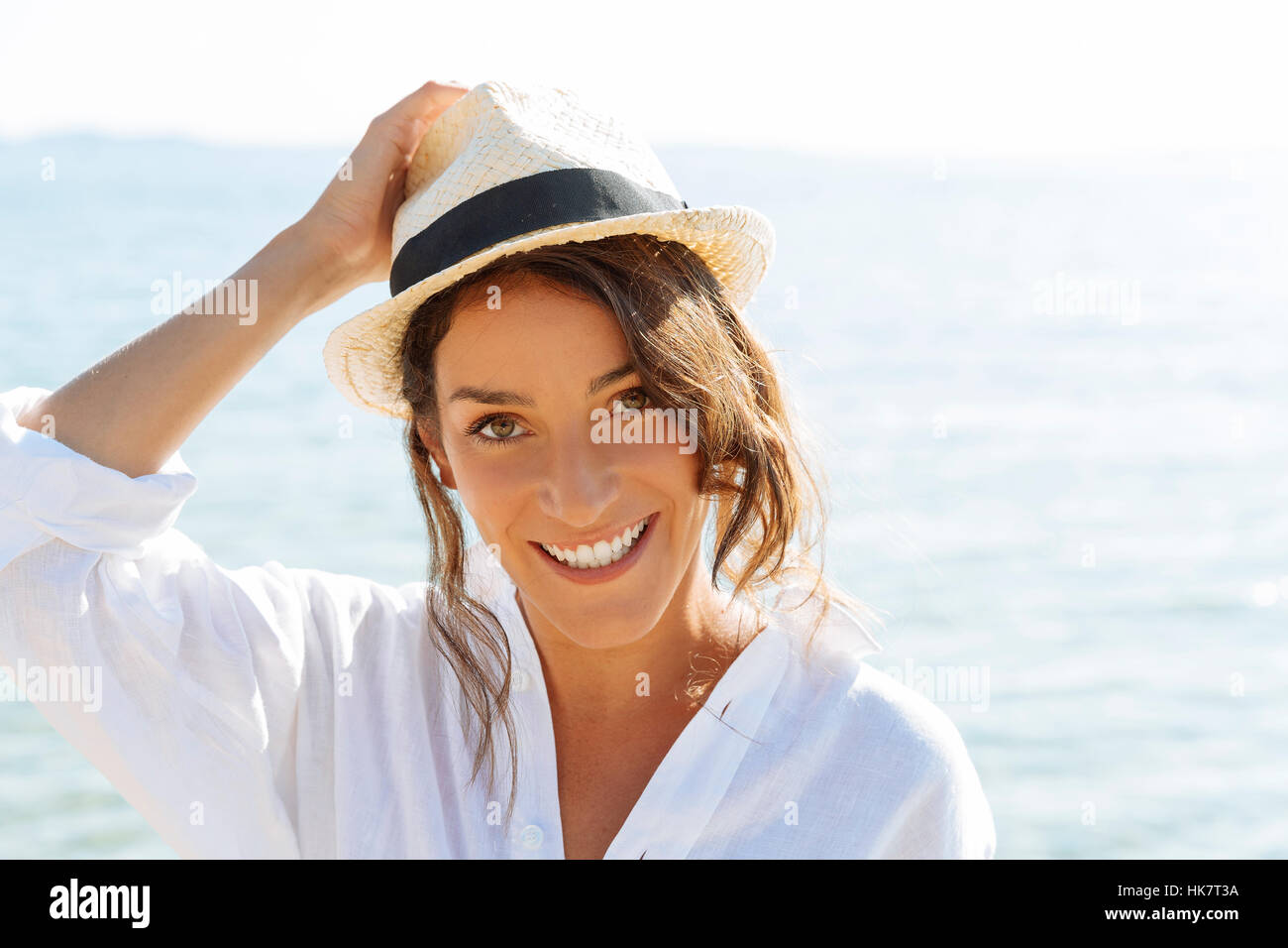 Happy woman on the beach Stock Photo