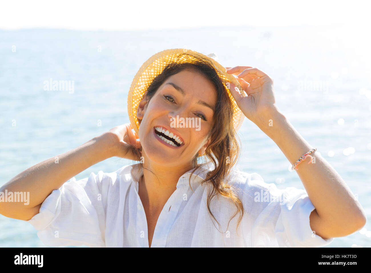 Happy woman on the beach Stock Photo