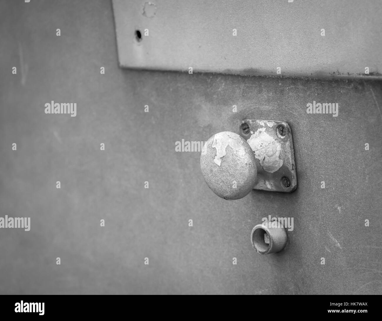 Weathered abstract doorknob in black and white Stock Photo