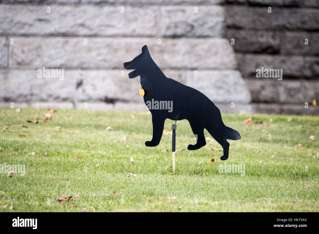 twirling dog bird scarer, use to frighten birds off a grass lawn Stock Photo