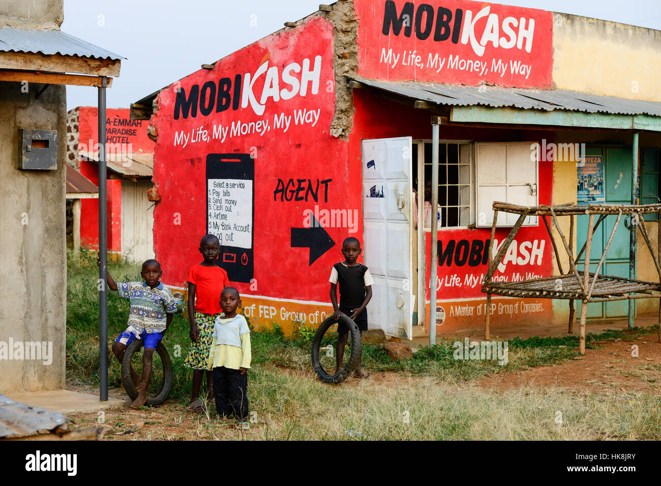 KENYA, County Siaya, village Kotanega, pay by mobile phone, ad Mobicash / KENIA, County Siaya, Dorf Kotanega, bezahlen per Mobiltelefon, MOBICASH Stock Photo