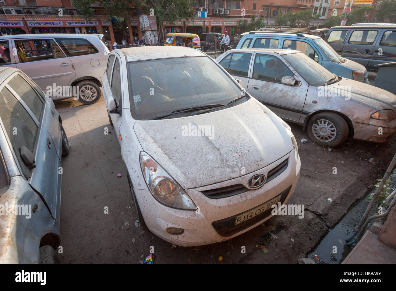 Dust and dirt deposits on parked cars, Jaipur, Rajasthan, India Stock