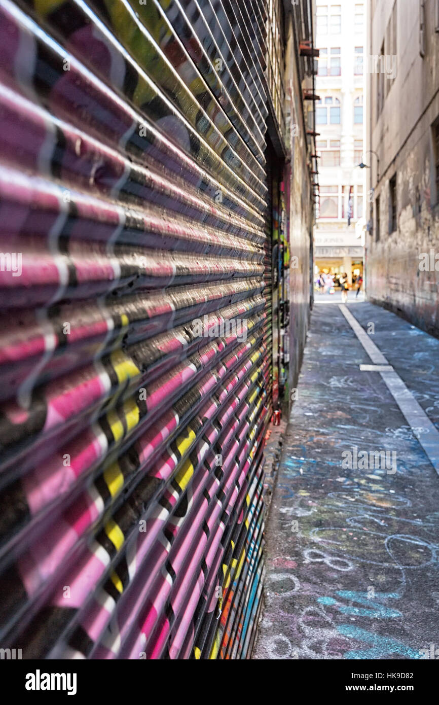 Close-Up of metal textured graffiti in a laneway, street art in a vibrant urban city Melbourne Stock Photo