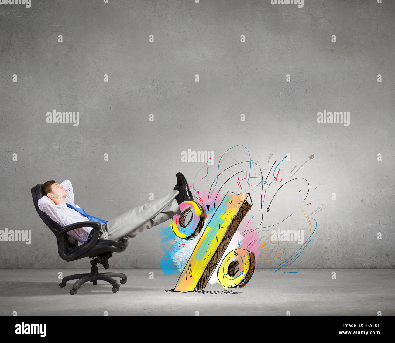 Confident businessman sitting on chair with legs up Stock Photo - Alamy