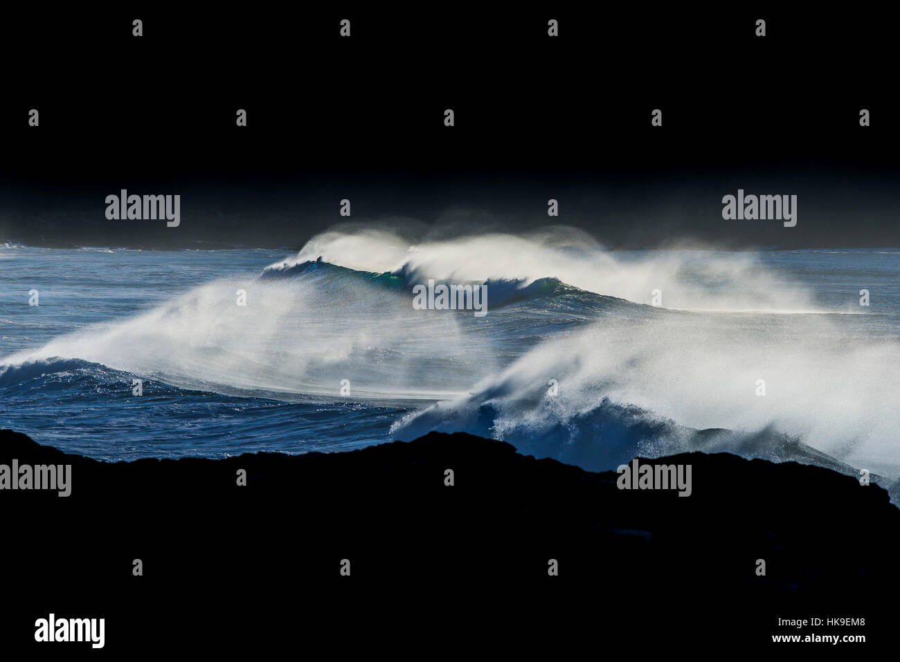 High wind Spray Waves Fistral Newquay North Cornwall UK weather Stock Photo