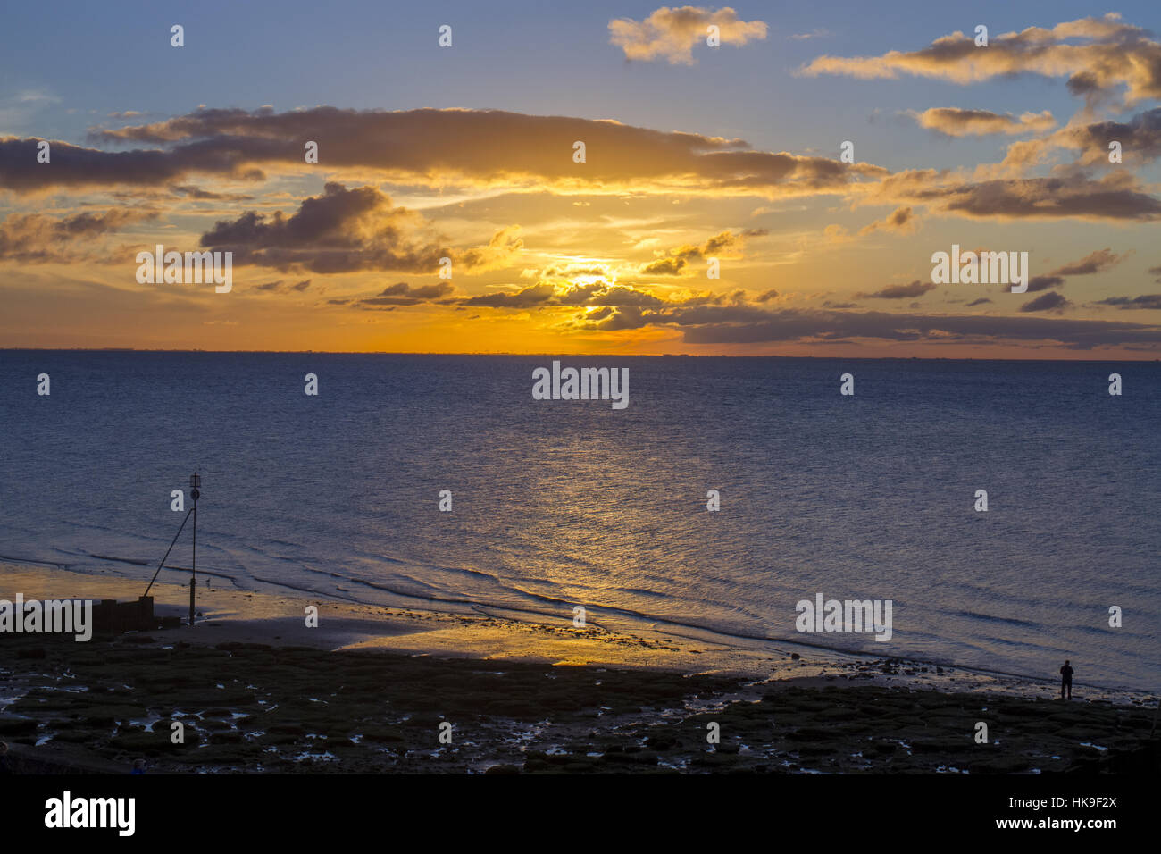 View over beach and The Wash at Sunset. Hunstanton, Norfolk, England. October. Stock Photo