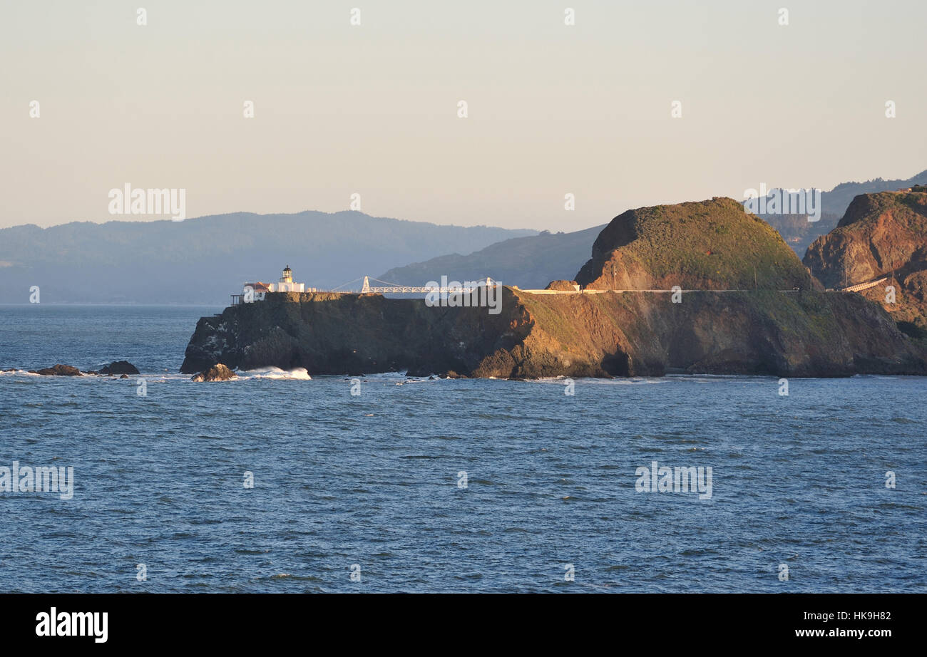 Lighthouse in rock coast in San Francisco Stock Photo