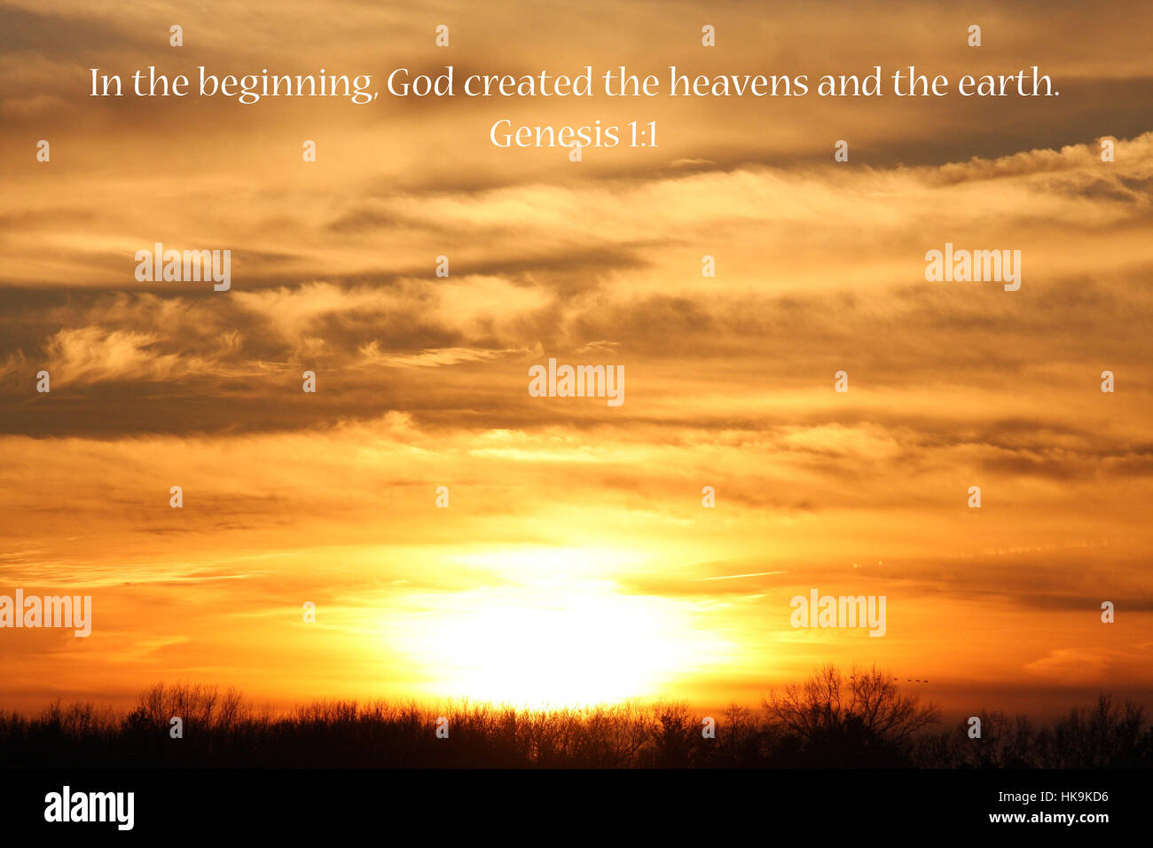 In the Beginning.  Bible verse over a sunset. Stock Photo