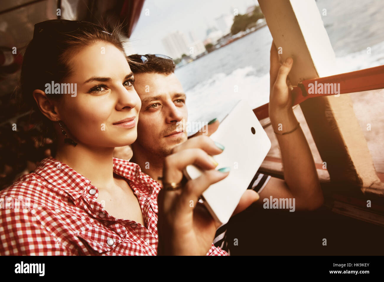Happy couple travelling boat river Stock Photo