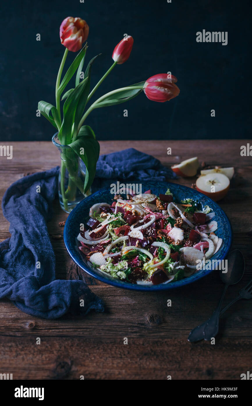 Beetroot, fennel and apple salad in a large serving bowl Stock Photo