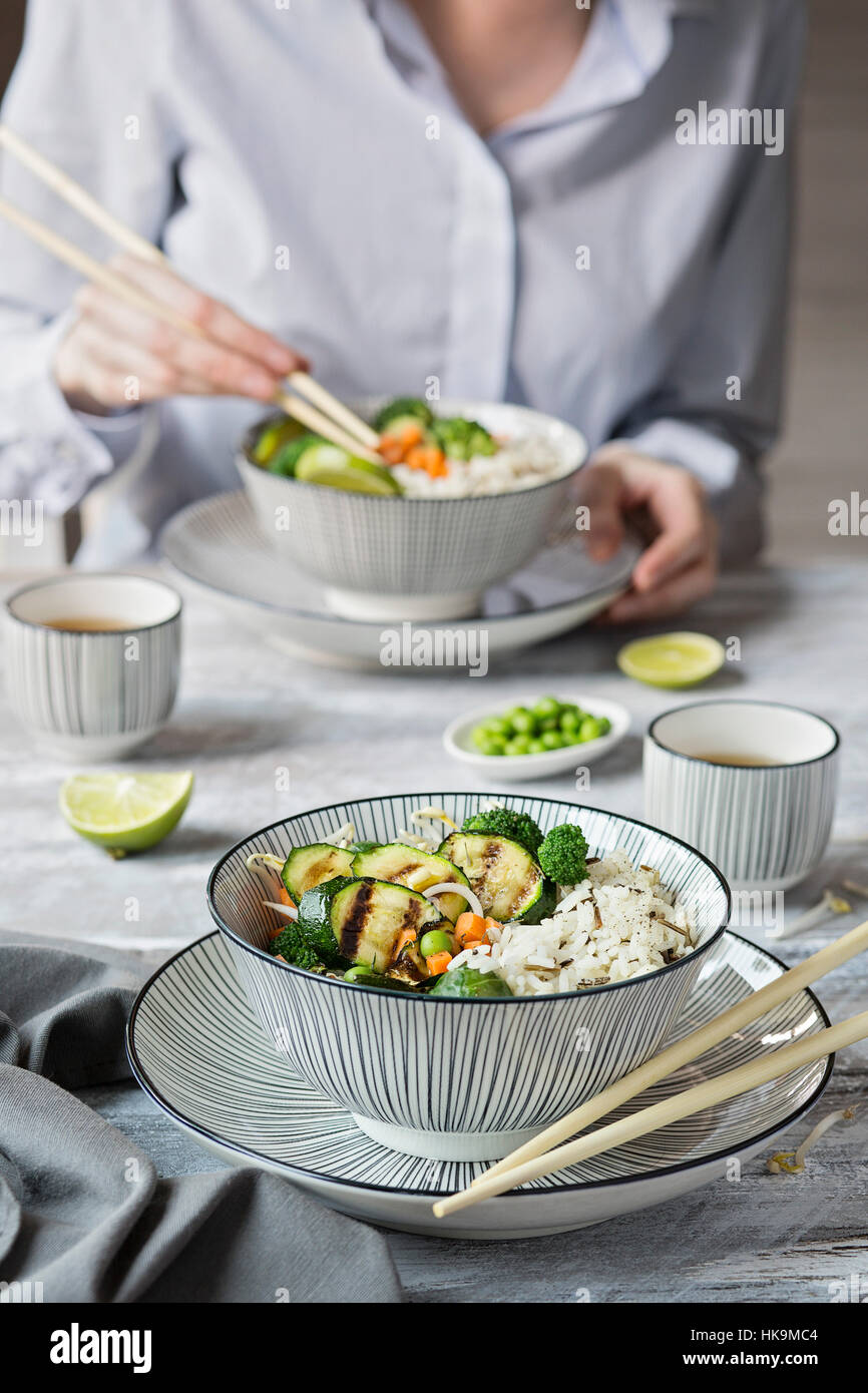 Basmati rice with vegetables on grey background Stock Photo