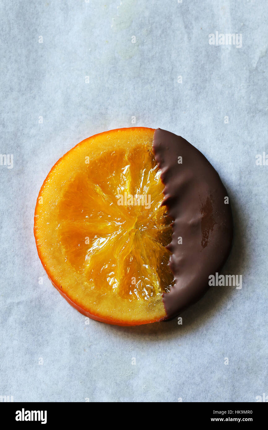 Candied orange slices coated with dark chocolate on white background.Top view Stock Photo Alamy